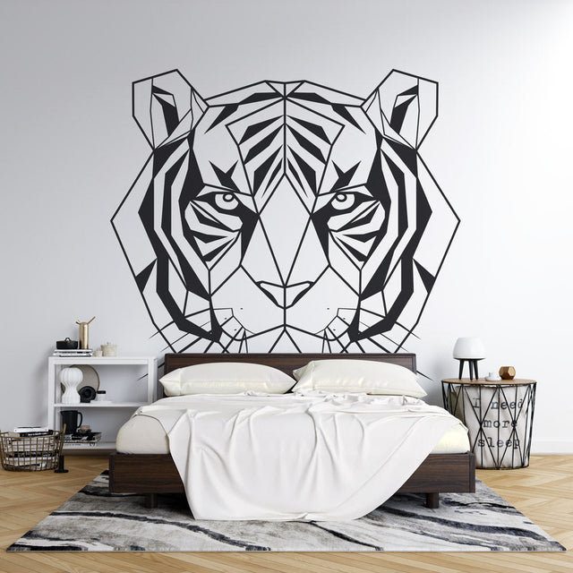 Black and white geometric tiger wallpaper creating dramatic impact in a minimalist living room with modern furniture