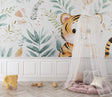 Tiger wallpaper mural in modern Scandinavian nursery with white furniture