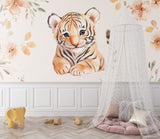 Floral tiger wallpaper in playroom setting with natural wooden toys