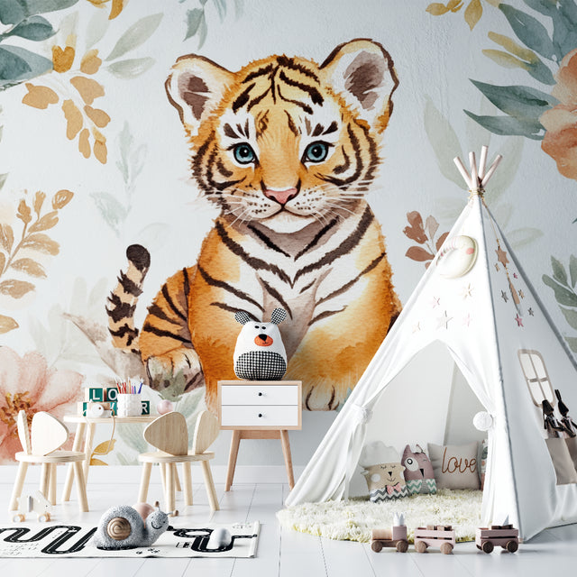 Tiger cub wallpaper in cozy nursery with white furniture and soft pink accents