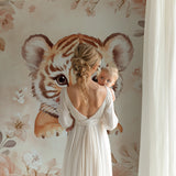 Baby tiger wallpaper creating a focal point in a modern children's playroom