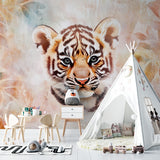 Baby tiger wall design in playroom showing scale and soft color palette
