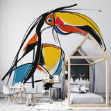 Modern abstract Toucan wallpaper creating a striking focal point in a minimalist living room with white furniture