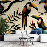 Tropical bird wallpaper with orange toucans and black leaves creating depth in a modern living room setting
