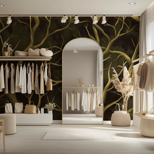 Tree branch wallpaper with gold details creating an elegant atmosphere in a modern living room