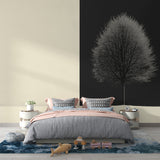 Minimalist tree wallpaper creating depth in modern living room, black branches on split beige backdrop