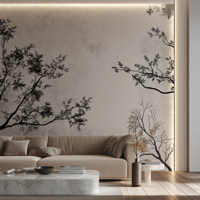 Black and white tree branch wallpaper creating depth in a modern living room setting