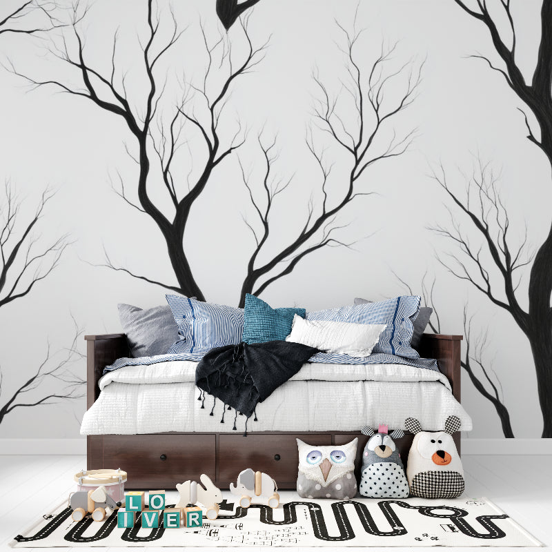 Black and white tree wallpaper in minimalist dining room with wooden table