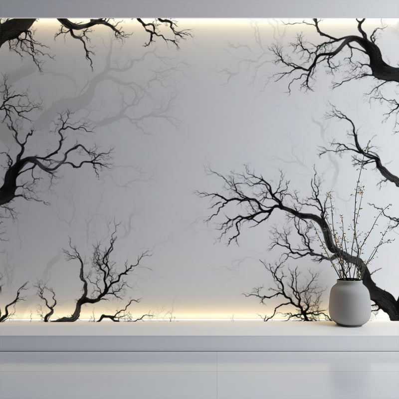 Minimalist bedroom featuring black tree silhouette wallpaper with white bedding