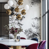 Home office featuring striking black and white tree mural wallpaper