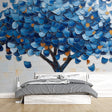 Blue and gold tree wallpaper mural creating a stunning focal point in a modern living room with natural light