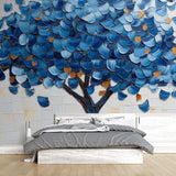 Blue and gold tree wallpaper mural creating a stunning focal point in a modern living room with natural light