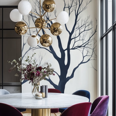 Minimalist black tree branch wallpaper creating drama in a modern living room with high ceilings