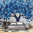 Blue mosaic tree wallpaper creating a peaceful atmosphere in a modern living room with natural light