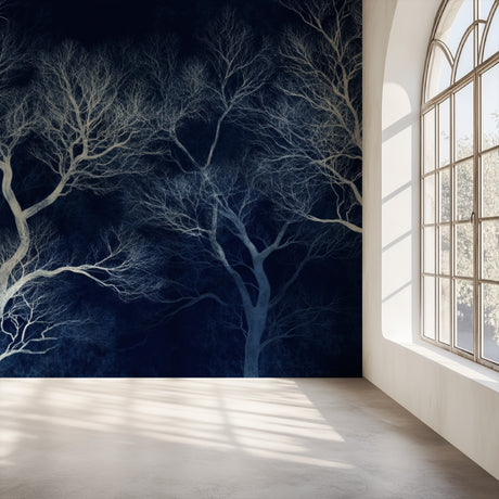 Tree branch wallpaper creating dramatic impact in modern living room with white furniture