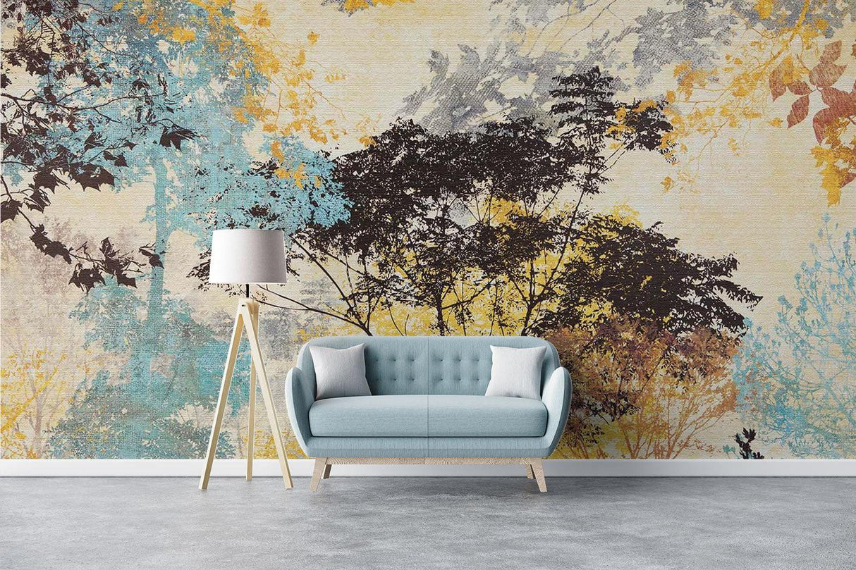Forest tree wallpaper creating a cozy atmosphere in modern living room with blue and gold accents