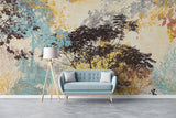 Forest tree wallpaper creating a cozy atmosphere in modern living room with blue and gold accents