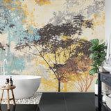 Blue and gold forest wallpaper transforming home office space with natural light