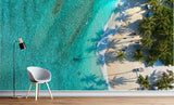 Beach vista wallpaper creating a calm atmosphere in a bright bedroom with natural lighting