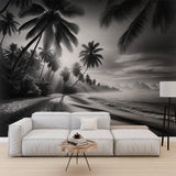 Black and white tropical beach wallpaper creating a peaceful atmosphere in a modern living room with minimal furniture