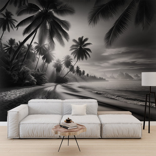 Black and white tropical beach wallpaper creating a peaceful atmosphere in a modern living room with minimal furniture