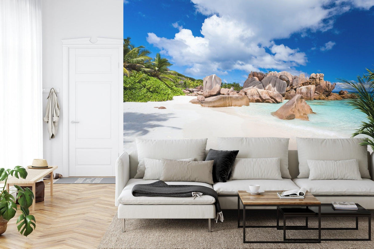 Beach scene wallpaper transforming a master bedroom into a peaceful coastal retreat