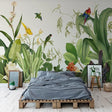 Tropical birds wallpaper creating a stunning focal point in a modern living room with natural light