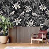 Black and white tropical birds mural adding depth to a cozy bedroom setting