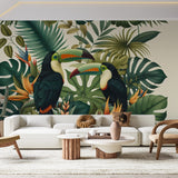 Tropical bird wallpaper with toucans and monstera leaves creating a stunning focal point in a modern living room
