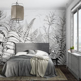 Botanical line art mural adding elegance to a minimalist bedroom space