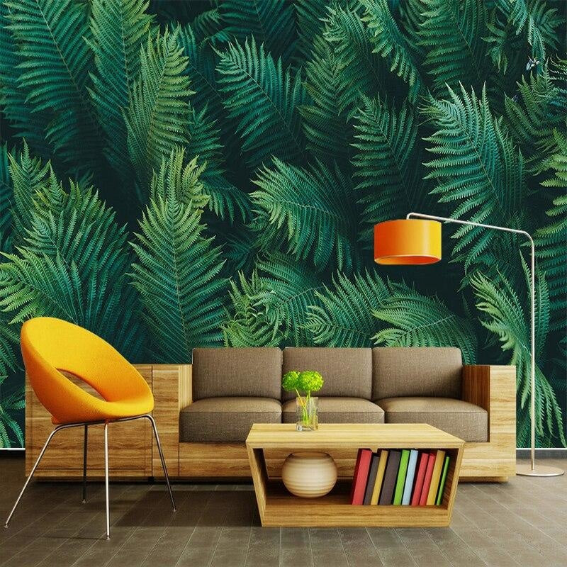 Tropical fern wallpaper creating a lush backdrop in a modern living room with natural light