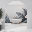 Tropical fern wallpaper in modern grey bathroom, gold accents catching morning light