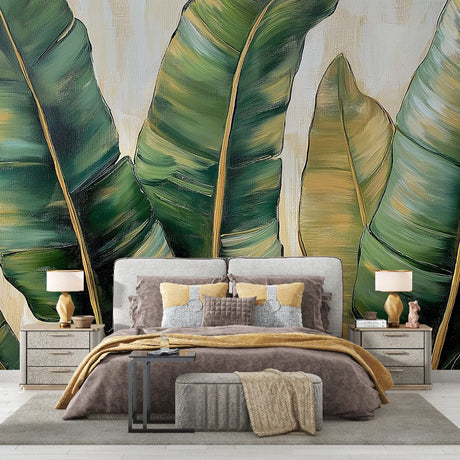 Tropical leaf wallpaper with gold accents creating a luxurious atmosphere in a modern living room with natural light