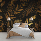 Black and gold botanical wallpaper creating a luxurious atmosphere in a modern dining room with ambient lighting