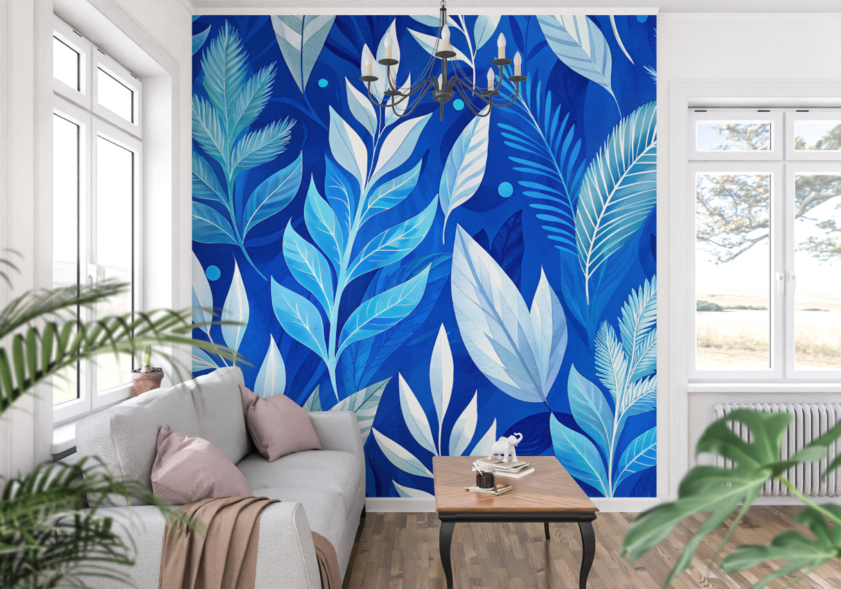 Coastal bedroom featuring blue palm leaf mural wallpaper with rattan furniture