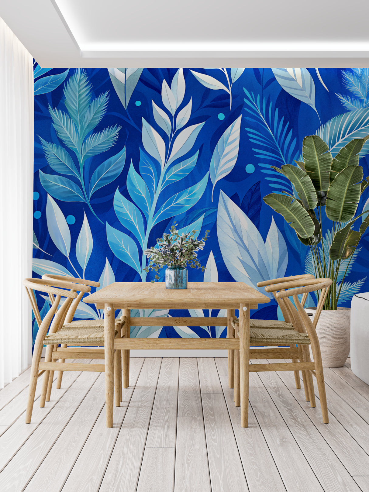 Home office with blue tropical foliage wallpaper creating a calm workspace
