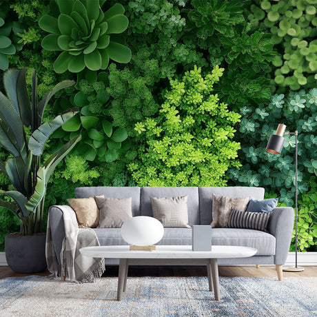 Tropical foliage wallpaper creating a fresh green backdrop in a modern living room with natural light
