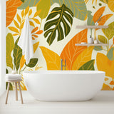 Tropical leaf wallpaper with orange and green monstera pattern brightening a modern living room with natural light