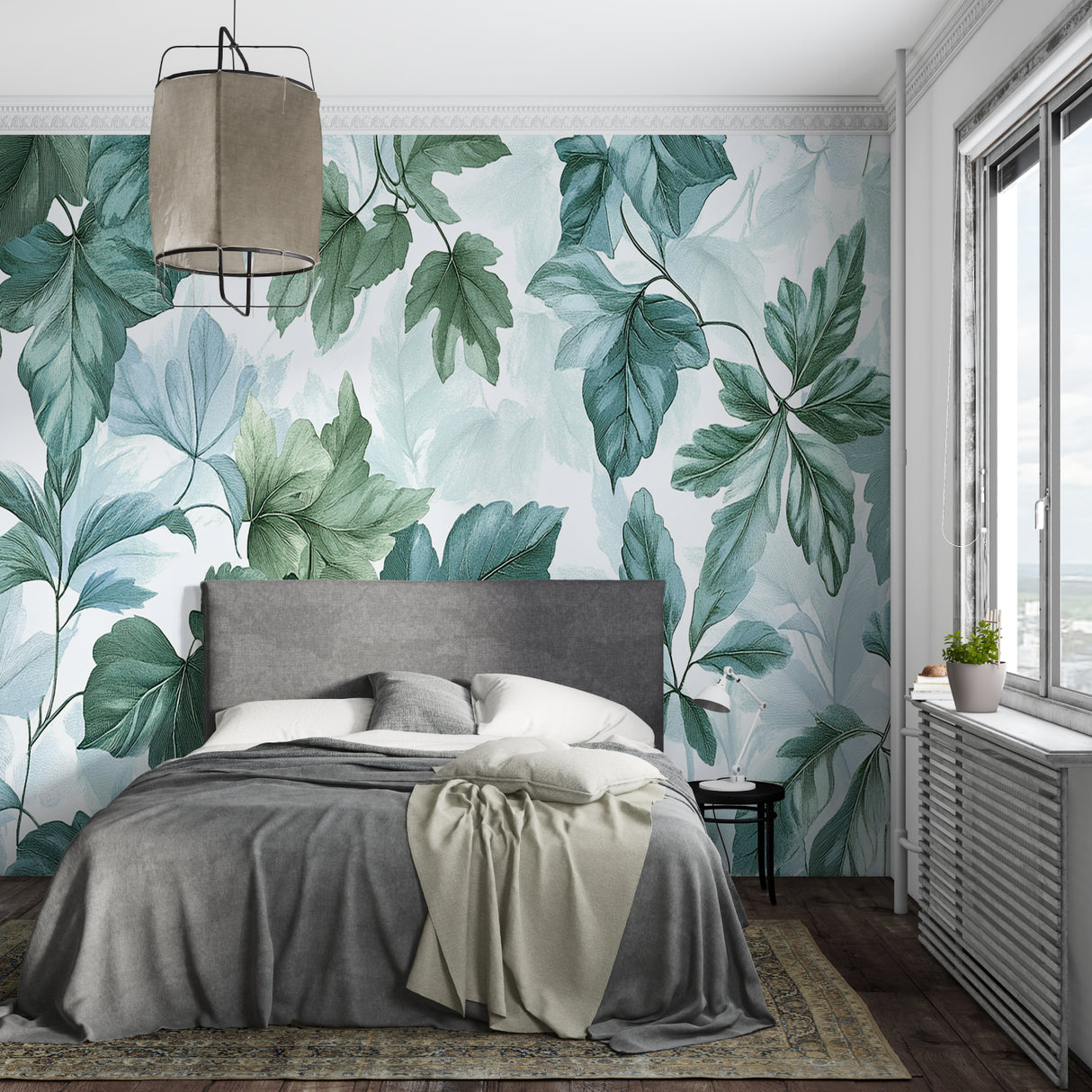 Sage green tropical leaf mural bringing nature into a calm bedroom setting