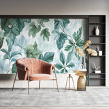 Tropical leaf wallpaper adding sophistication to a dining room with pendant lighting