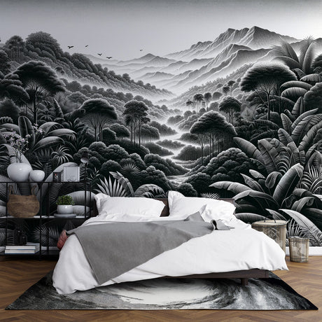 Black and white tropical forest wallpaper creating depth in a modern living room with minimal furniture