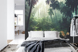 Tropical wall mural bringing life to a home office space with misty forest vibes