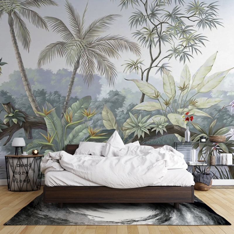 Exotic jungle mural adding depth to a minimalist bedroom with soft lighting