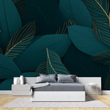 Green and gold botanical wallpaper in home office setup