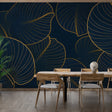 Tropical leaf wallpaper in navy and gold creating drama in a modern living room