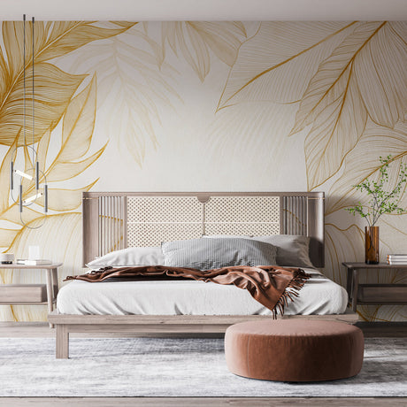 Tropical leaves gold line art wallpaper creating an elegant atmosphere in a modern living room with natural light