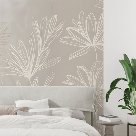 Tropical line art wallpaper in modern living room showing minimalist leaf pattern on beige background