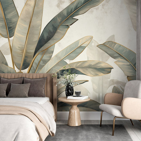 Tropical leaf wallpaper in sage green and gold creating a peaceful atmosphere in a modern living room