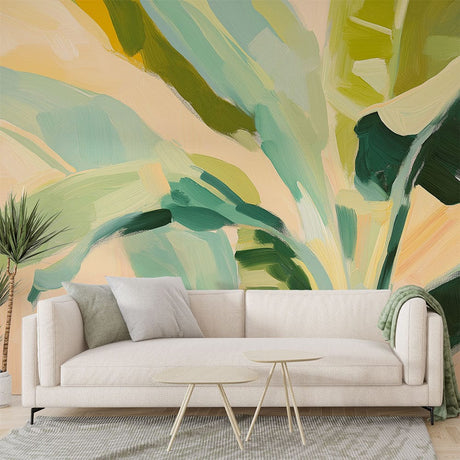 Tropical leaf wallpaper creating a stunning accent wall in a modern living room with natural light and minimal furniture