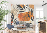 Orange and black palm leaf pattern creating depth in a bedroom